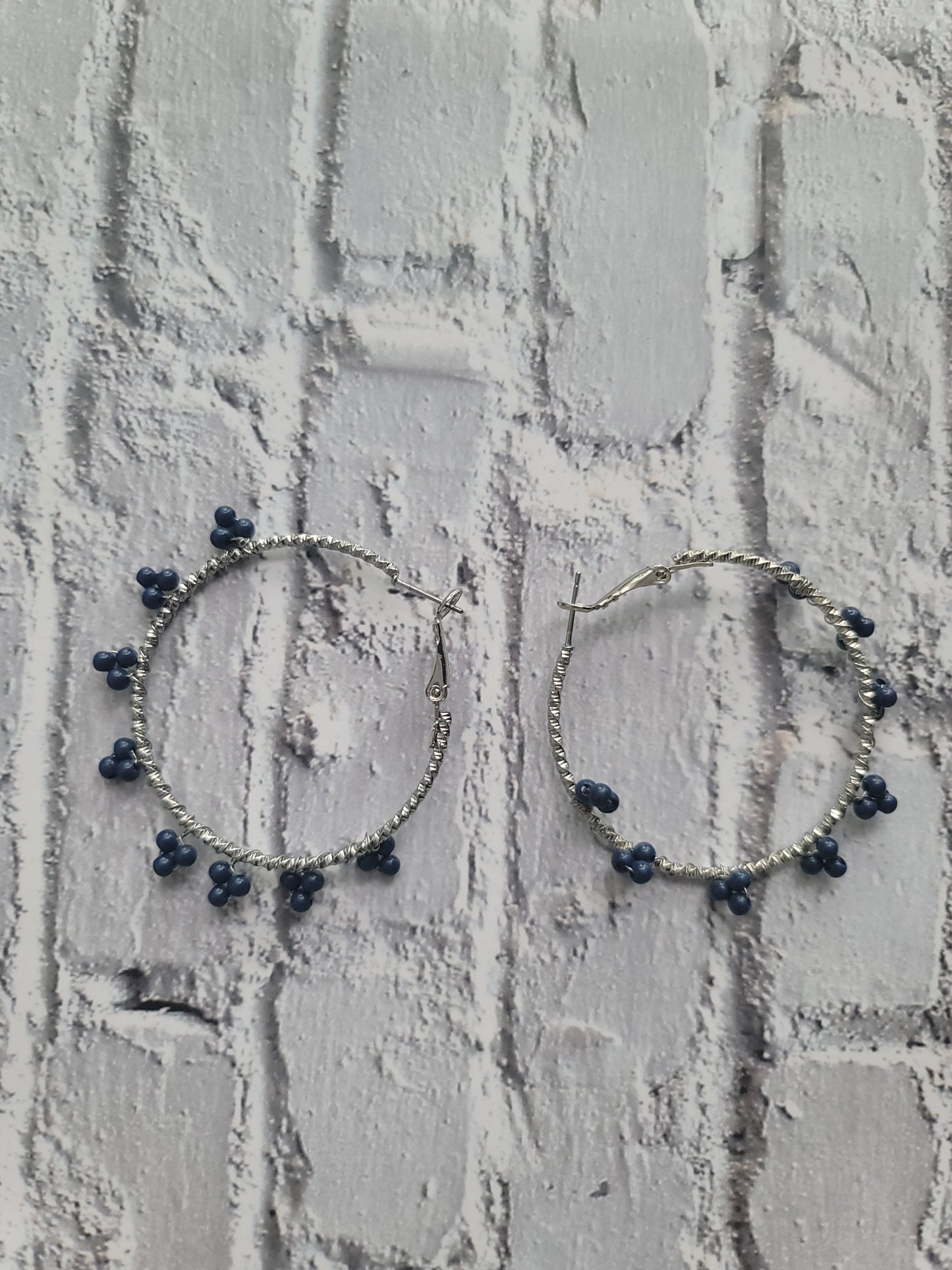 Silver Hoop Earrings with Flower Beads
