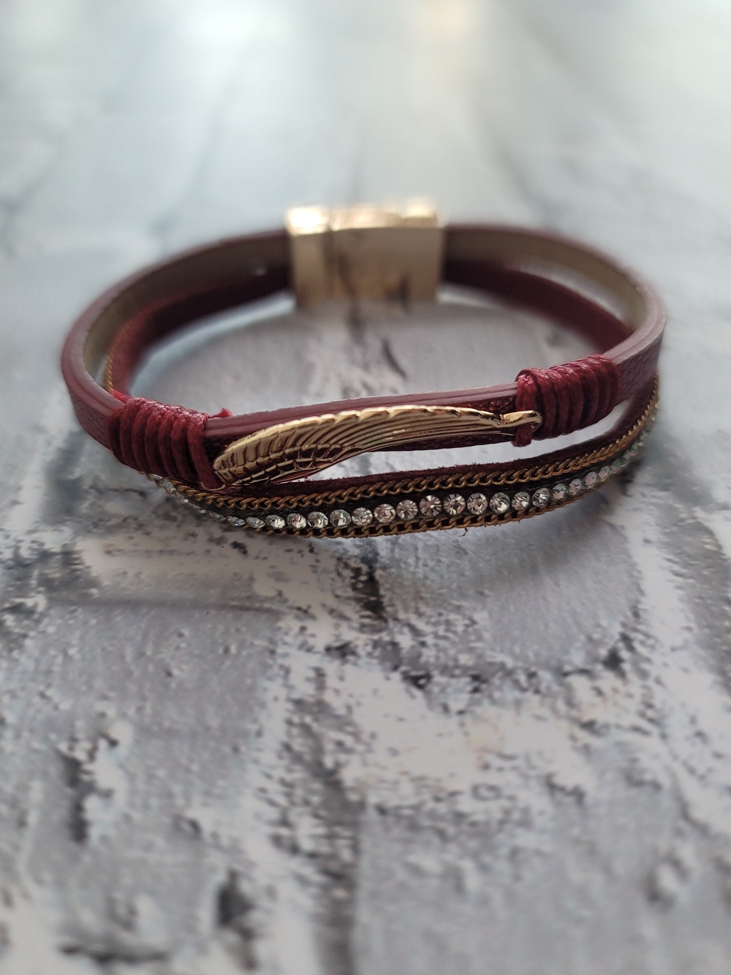 Vintage Leather Bracelet with Crystal Accents and Gold Feather Detail